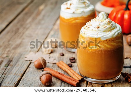 ice honey pumpkin spice latte with whipped cream. the toning. selective focus Royalty-Free Stock Photo #295485548
