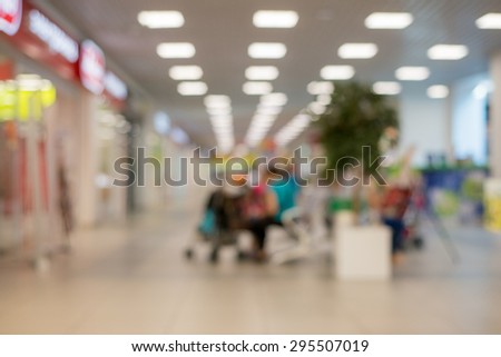 blurred picture of a trading hall with showcases 