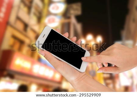 Closeup of businessman using smart phone