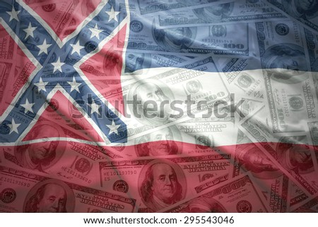 colorful waving mississippi state flag on a american dollar money background