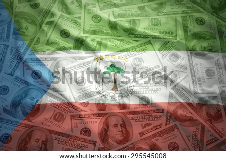 colorful waving equatorial guinea flag on a american dollar money background