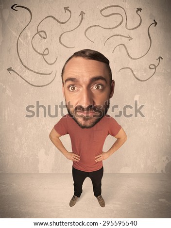 Funny guy with big head and drawn arrows over it
