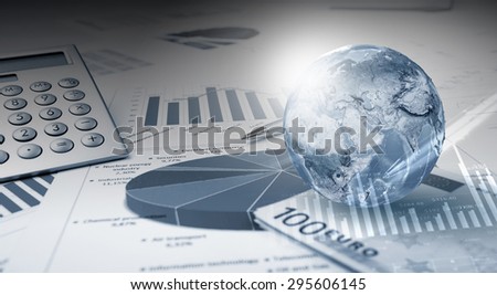 Abstract image planet earth on background of business devices. Elements of this image are furnished by NASA