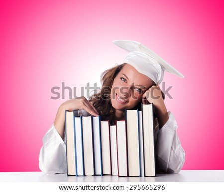 Graduate with book against the gradient 