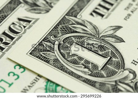 a fragment of one dollar bills abstract background
