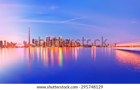 Panorama of Toronto skyline at twilight in Ontario, Canada.