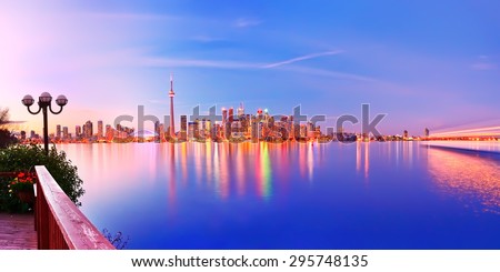 Panorama of Toronto skyline at twilight in Ontario, Canada.