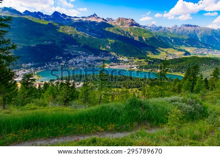 View of St. Moritz from a mountain trail in summer Royalty-Free Stock Photo #295789670