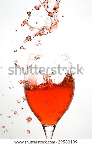 Red wine.Creative splashing wine.