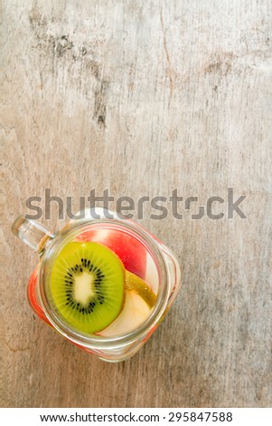 Infused Water on wooden background
