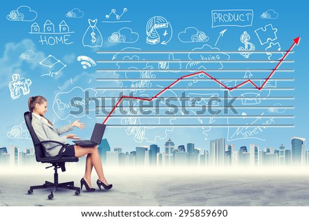 Happy woman sitting in chair working on laptop on abstract virtual background with business words