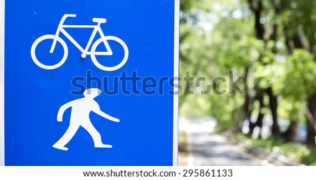 Bicycle and walking blue sign, The Pathway of bicycle and Walking at the garden park