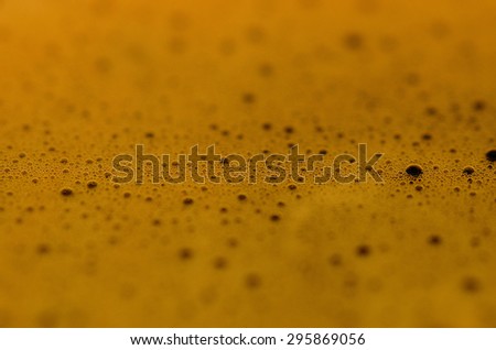 many small air bubbles in the coffee foam