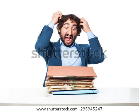 stressed businessman with files