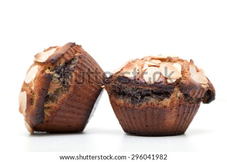 Muffins with poppy isolated on a white background