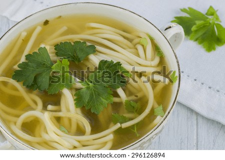 Clear chicken soup with noodles