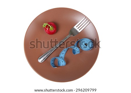 Measuring tape,radishes and fork on a plate isolated on a white background.