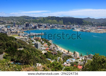 Wellington City harbor and downtown. Buildings are in central business district. Royalty-Free Stock Photo #296224736