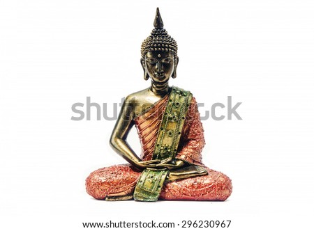 Isolated red and golden Buddha statue on white background