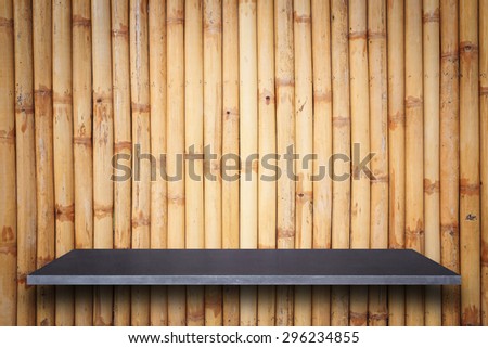 Empty top of natural stone shelves and wooden wall background. For product display 