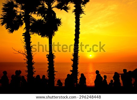 Silhouette people relax with color of the sunset