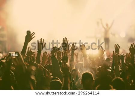 Crowd at concert - retro style photo Royalty-Free Stock Photo #296264114