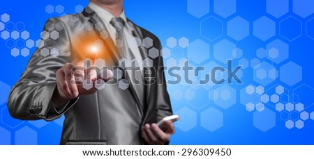 businessman pointing on digital screen, business technology concept