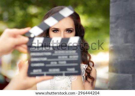 Elegant Woman Ready for a Shoot - Young actress ready to film a new scene 
 Royalty-Free Stock Photo #296444204