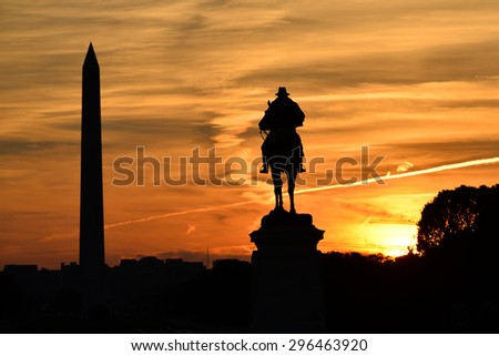 Washington DC - Ulysses S. Grant Memorial and Washington Monument silhouettes in sunset
