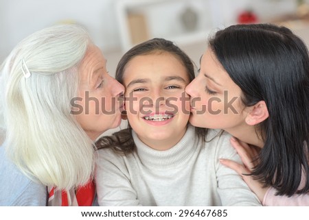 A kiss form mom and grandma
