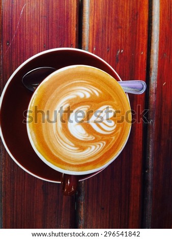 Latte art coffee. A cup of love. Heart latte art coffee in a cup