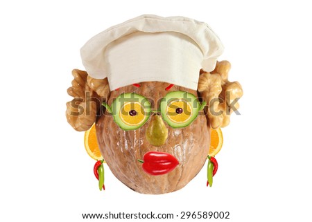 Creative food concept. Funny portrait of a cook, made of nut, fruit and vegetable
