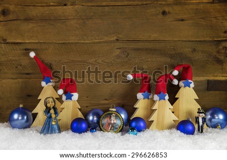 Wooden christmas background with red, white and blue decoration.