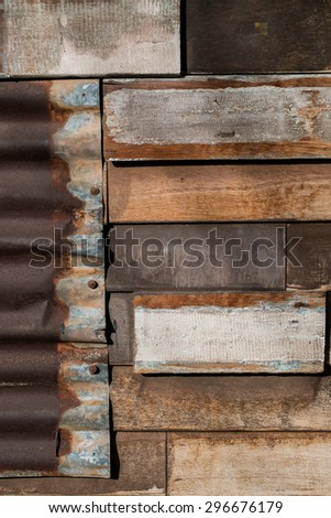 rusted galvanized iron plate and old wood background