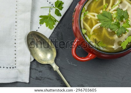 Clear chicken soup with noodles
