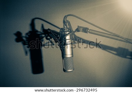 Professional condenser studio microphone with shadow, Musical Concept