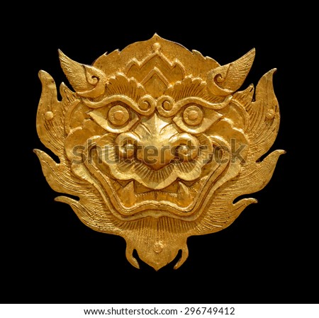 Ancient Thai art golden lion-singha, isolated on black background with clippingpath Royalty-Free Stock Photo #296749412