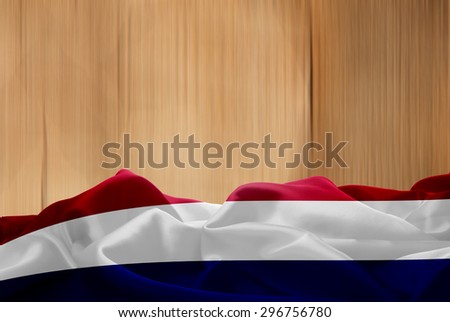 Netherlands flag and wood background