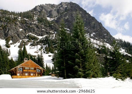 Ski Chalet at foothill of high mountain