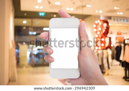Photo blank. Taking a picture with a smart phone in shopping mall.