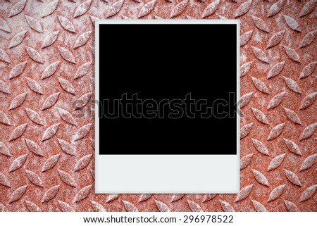Photo frame on Stained diamond metal sheet.