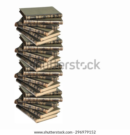 vertical stack of books. Many books lie one above the other on a white background isolation