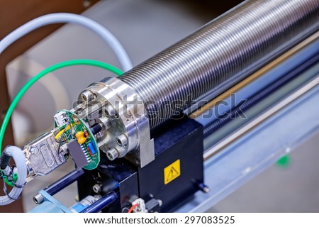 Detail of stainless steel machinery in physics laboratory Royalty-Free Stock Photo #297083525