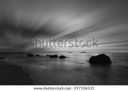 Black and white scene of beach with radial blur effect
