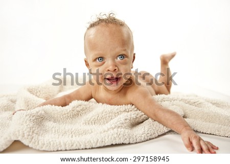 A cute baby isolated on a white background.