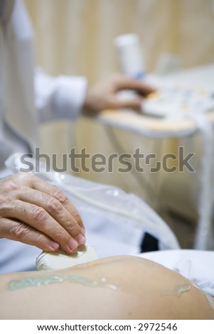Picture of a doctor doing ultrasound