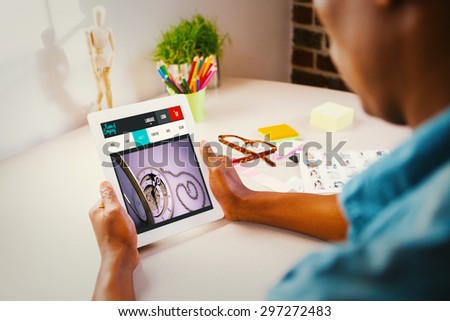 Photo editor using tablet pc against website design