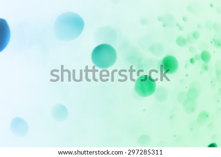 Abstract Bokeh background created by light and water spray in vivid color.