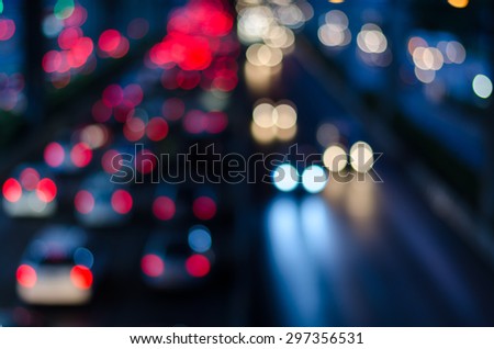 Blurry night light traffic in Bangkok city, Thailand. Abstract defocused background.