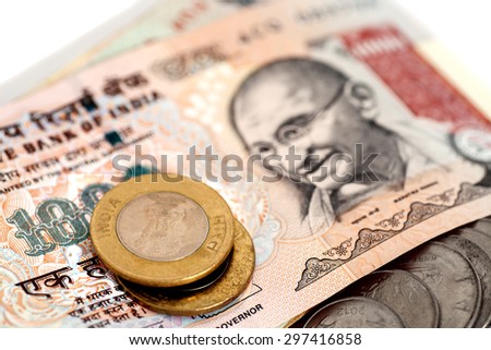 Indian Currency Rupee Notes and Coins Royalty-Free Stock Photo #297416858